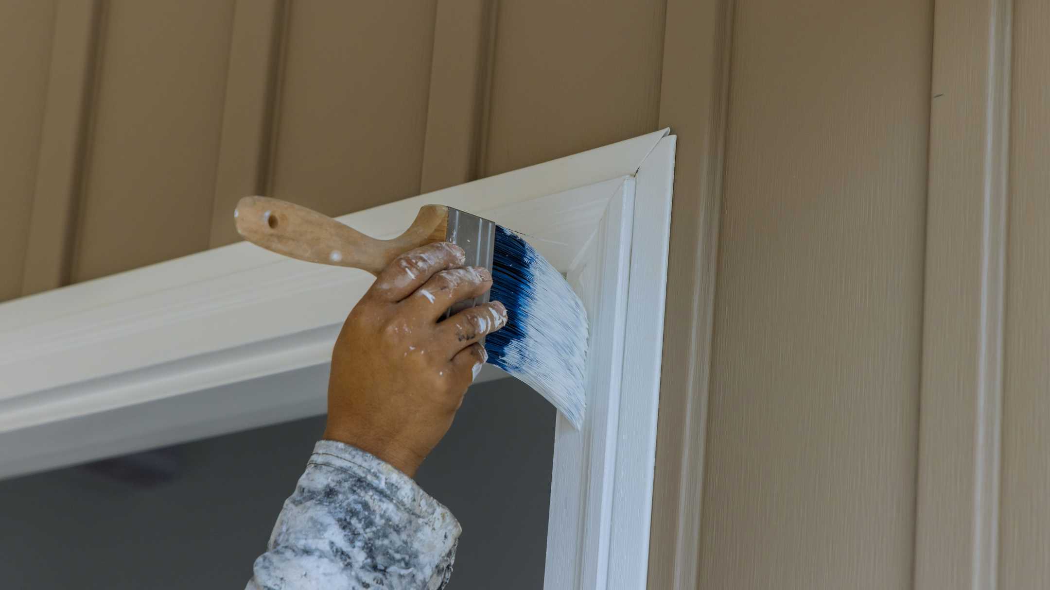 professional painting trim of corner of door